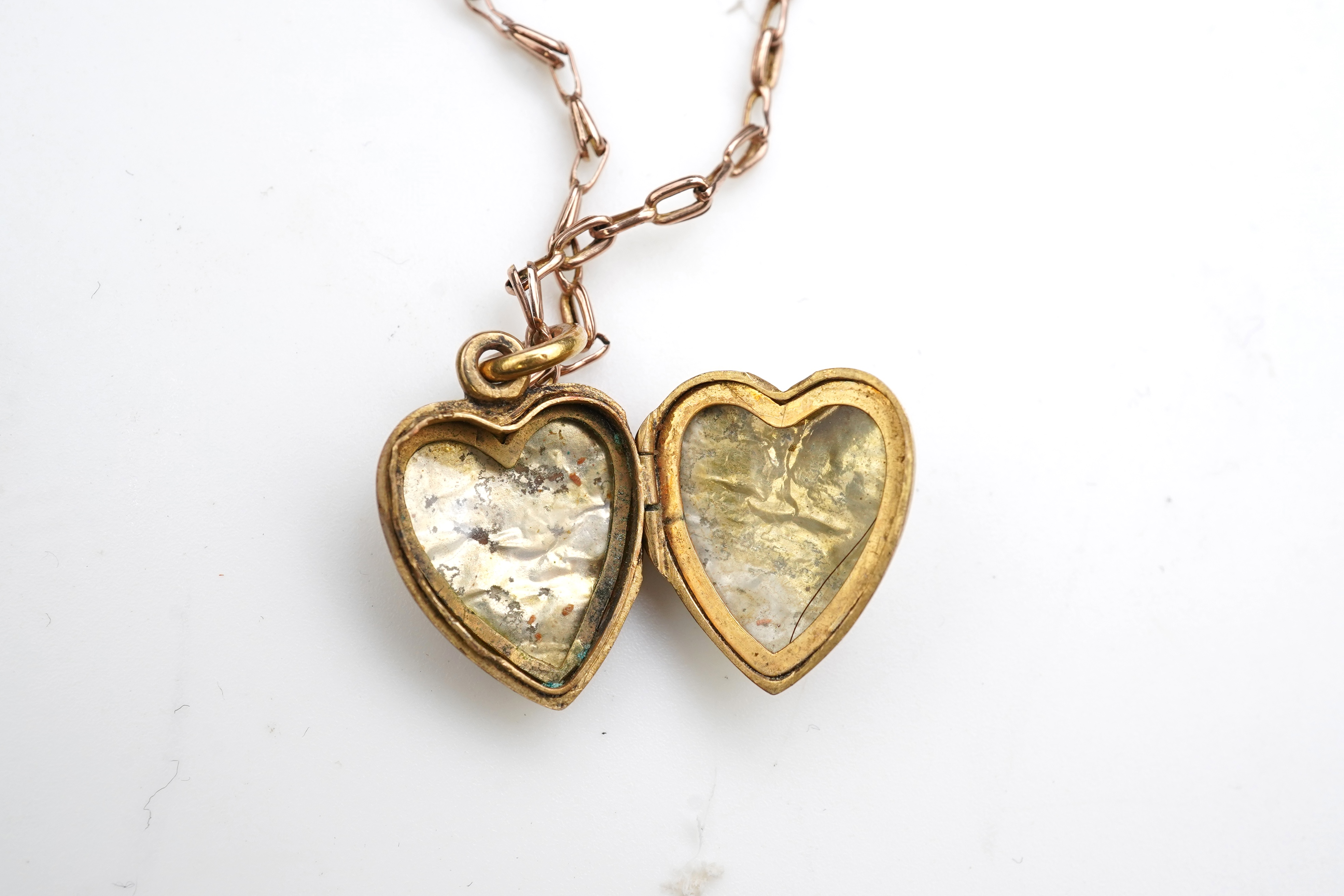 A ruby, sapphire and diamond locket pendant, early 20th century